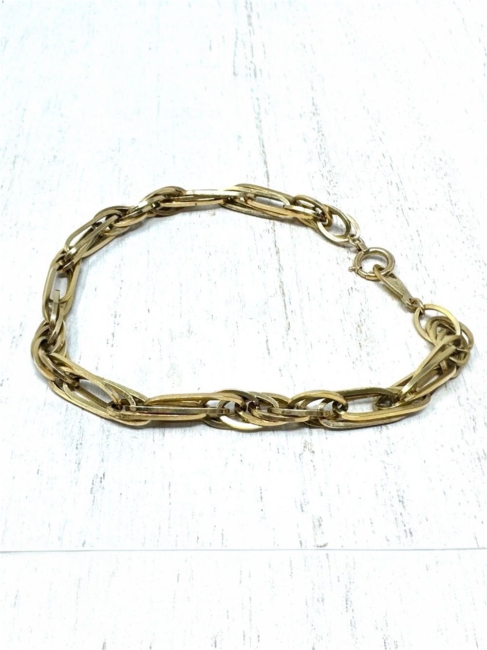 18K yellow gold interlocking bracelet, 11.8g